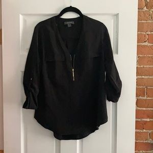 Women’s black zippered blouse